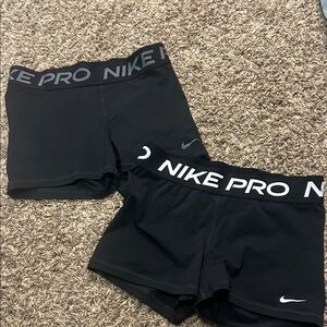 Two pack of Nike Pro shorts